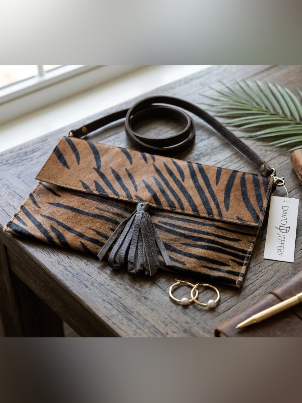 David Jeffery hair-on-hide tiger print foldover crossbody clutch bag.